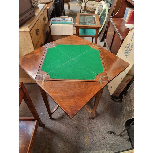 716 - Star Lot : A stunning antique Edwardian envelope  games table with unusual cross fold top which twis... 