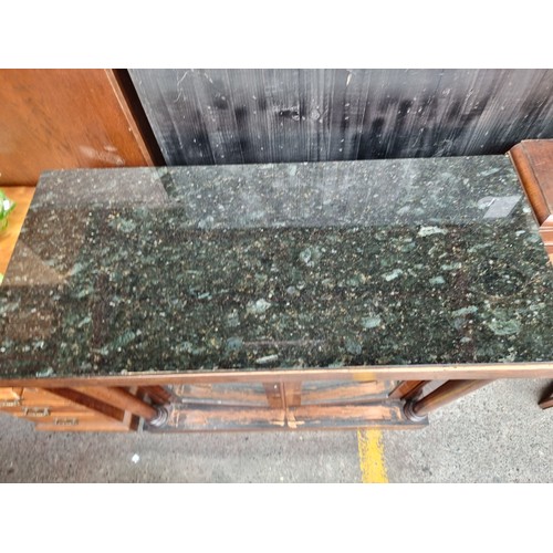 747 - Star Lot : A handsome 19th century cabinet with a deep green and black granite countertop. The mirro... 