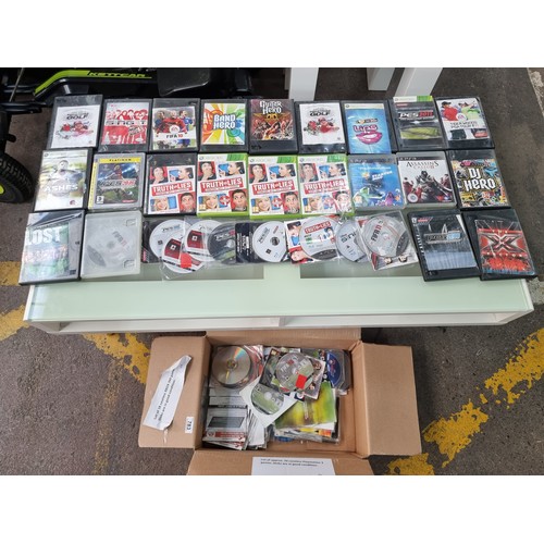 783 - A box filled with eighty-eight caseless Playstation 3 and Xbox 360 games. Discs are in good conditio... 