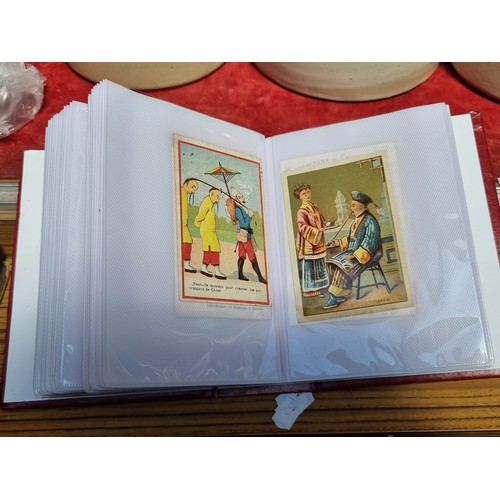 362 - An album containing 100 collectible antique and vintage advertisement cards all in French. Advertisi... 