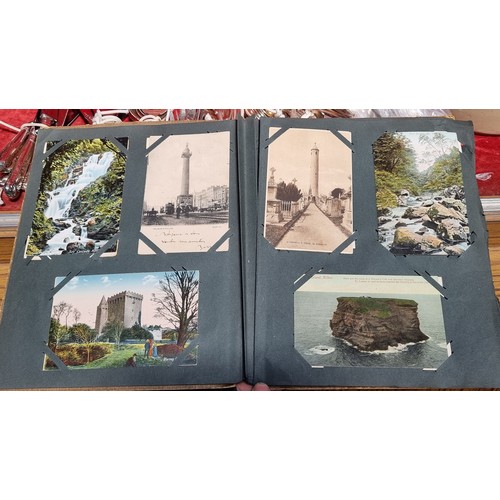 363 - A vintage postcard album containing 90 postcards including examples showing popular tourist destinat... 