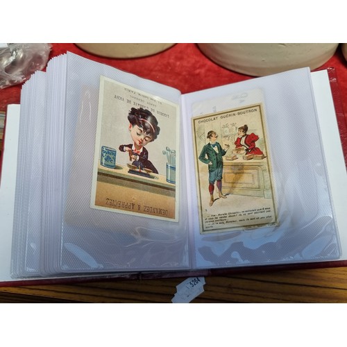 362 - An album containing 100 collectible antique and vintage advertisement cards all in French. Advertisi... 