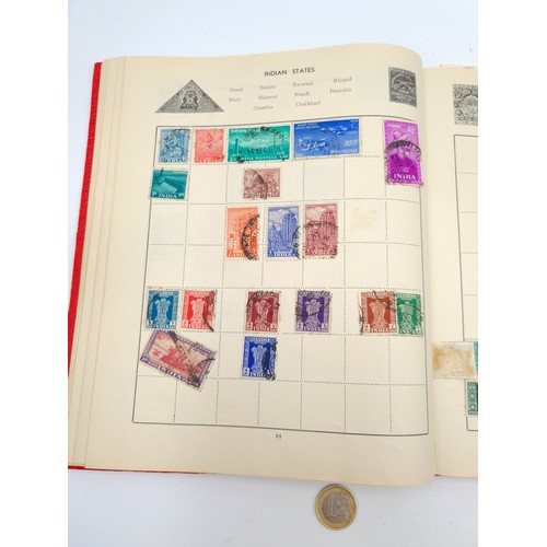 96 - A good vintage stamp album holding a wide variety of global stamps including a particularly rich col... 