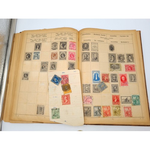 97 - A very good vintage stamp album holding a wide variety of global stamps including English examples s... 