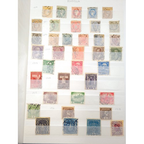 149 - A stamp album containing 714 Austrian stamps dating from between 1871-1988 along with 71 Lichtenstei... 