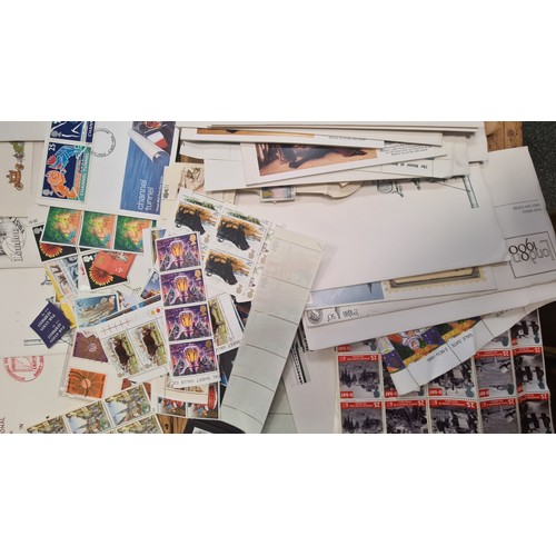 67 - A box filled with stamp sheets and first day covers including dozens o vintage English examples. Goo... 