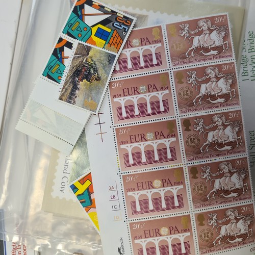 67 - A box filled with stamp sheets and first day covers including dozens o vintage English examples. Goo... 