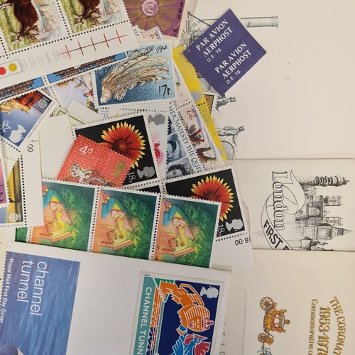 67 - A box filled with stamp sheets and first day covers including dozens o vintage English examples. Goo... 