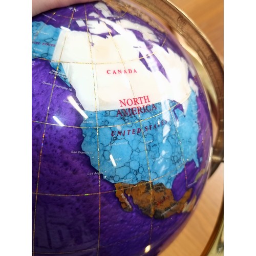 291 - Star Lot : A large beautiful rotating globe in a striking purple finish with semi-precious stone cou... 