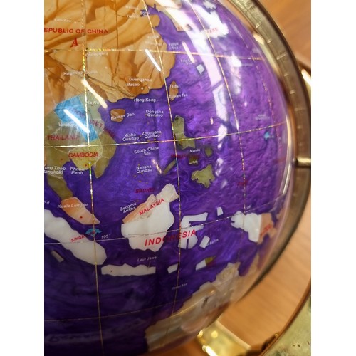 291 - Star Lot : A large beautiful rotating globe in a striking purple finish with semi-precious stone cou... 