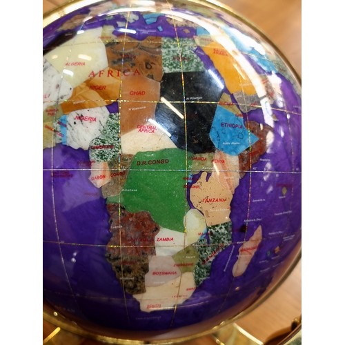 291 - Star Lot : A large beautiful rotating globe in a striking purple finish with semi-precious stone cou... 