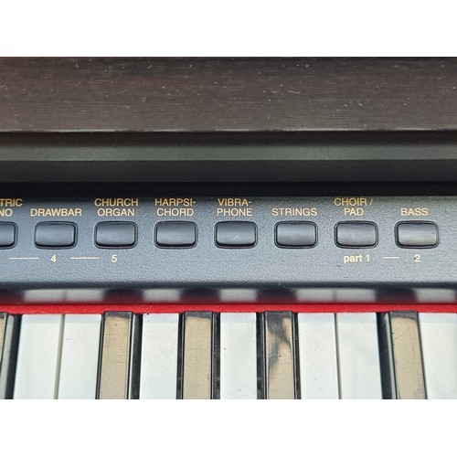 634 - Star lot : A Kawai digital piano model no. CN390 with full sized weighted keyboard, wooden frame, th... 