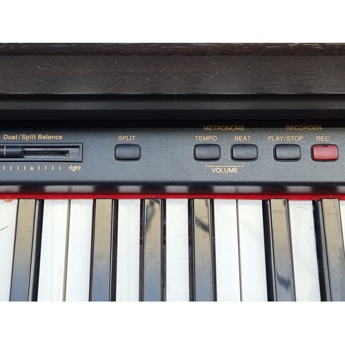 634 - Star lot : A Kawai digital piano model no. CN390 with full sized weighted keyboard, wooden frame, th... 