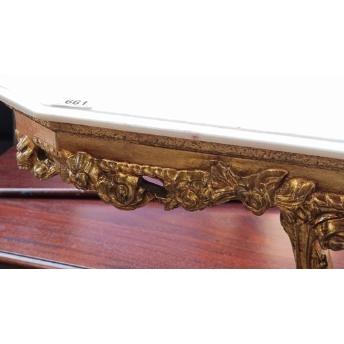 661 - Star Lot : A striking Baroque style console table with highly ornate gilt stem consisting of a cheru... 