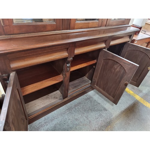 713 - Star lot : A large and impressive Mahogany triple dresser with three glass fronted display cabinets ... 