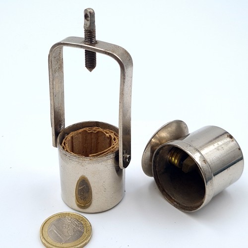 14 - A very interesting vintage pocket carrier flash light of chrome metal, set with a battery holder and... 