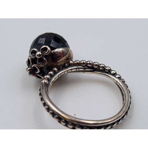 29 - A collection of three Pandora items, including a sterling silver ring, set with a stone setting. Rin... 