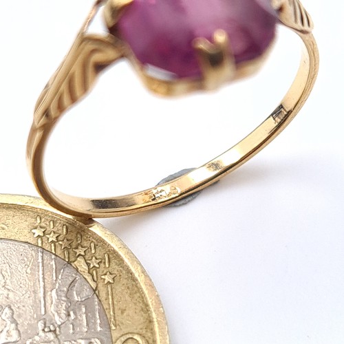 37 - Star Lot : An exquisite antique 9 carat gold Amethyst ring. Ring size: M. Weight: 1.81 grams.