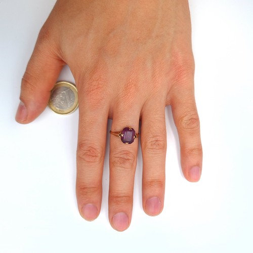 37 - Star Lot : An exquisite antique 9 carat gold Amethyst ring. Ring size: M. Weight: 1.81 grams.
