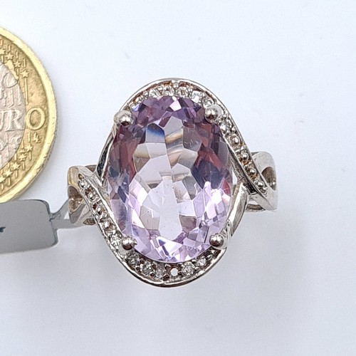 42 - A new huge Amethyst sterling silver silver ring, set with twist gem stone shoulders. Ring size: Q. W... 