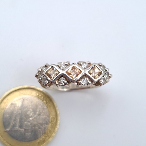 49 - A heavy unusual mounted stone set sterling silver ring. Ring size: K. Weight: 5.74 grams.