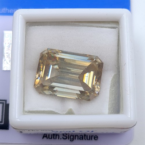 54 - A certified 13.14 carat facet cut Moissanite stone, of excellent quality. This gem stone is fully ce... 