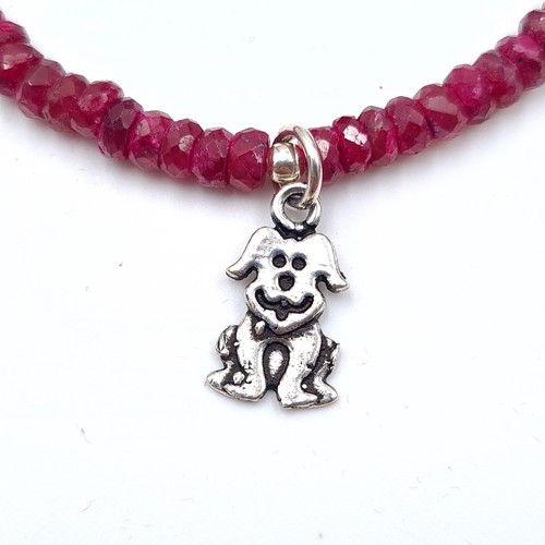 60 - A very attractive genuine Ruby  necklace and bracelet set. Set in Sterling Silver the necklace is se... 