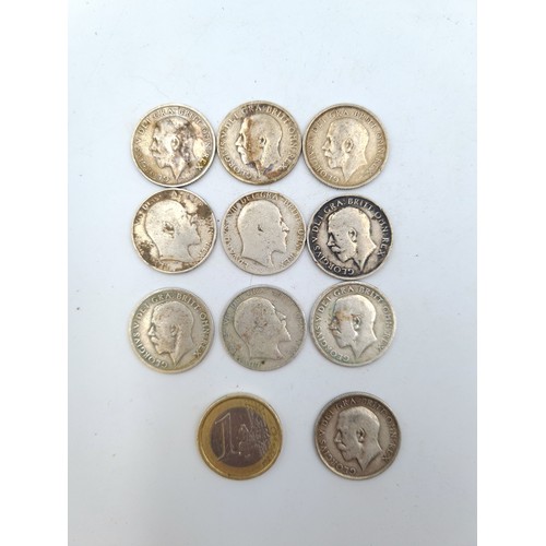 102 - Ten antique English one shilling coins dating from 1906 to 1917. All with 0.750 silver content. 
Tot... 