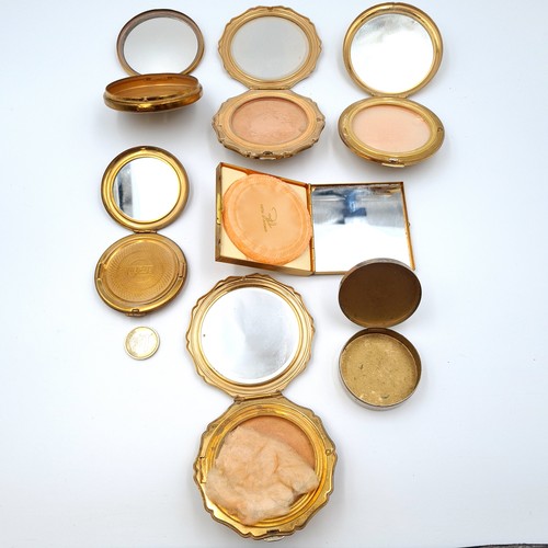 580 - An excellent collection of six vintage powder compacts, together with a hinged pin box. Of interest,... 