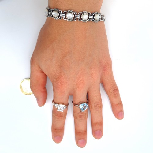 595 - A beautiful sterling silver hallmarked Moonstone bracelet, set with Marcasite detail. Together with ... 