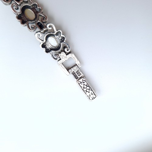 595 - A beautiful sterling silver hallmarked Moonstone bracelet, set with Marcasite detail. Together with ... 