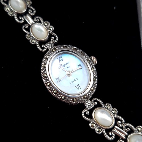 603 - A very attractive hallmarked silver ladies cocktail watch, set with ten Moonstones and Marcasite flo... 