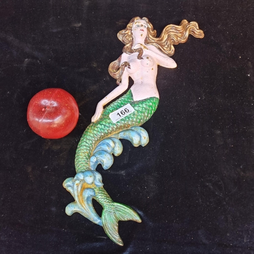 166 - A charming wall hanging mermaid figure in cast metal. Handpainted in a realistic colour palette with... 