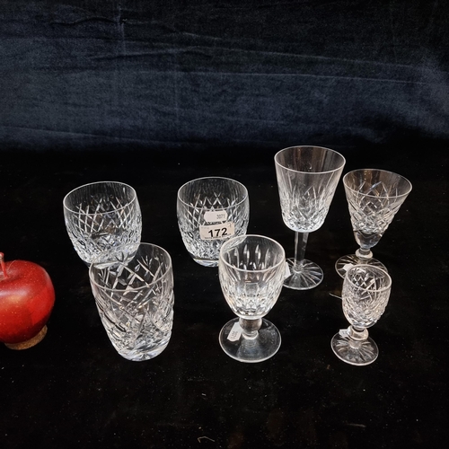 172 - A selection of seven Waterford Crystal drinking glasses. Including a pair of large whiskey tumblers ... 