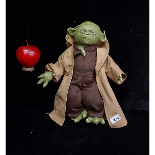 239 - A very detailed retro soft rubber Yoda character from the Star Wars franchise. With original garment... 