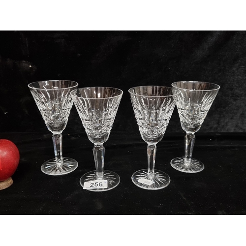 256 - A set of four vintage Waterford Crystal claret wine glasses in the Tramore pattern. With acid etchin... 