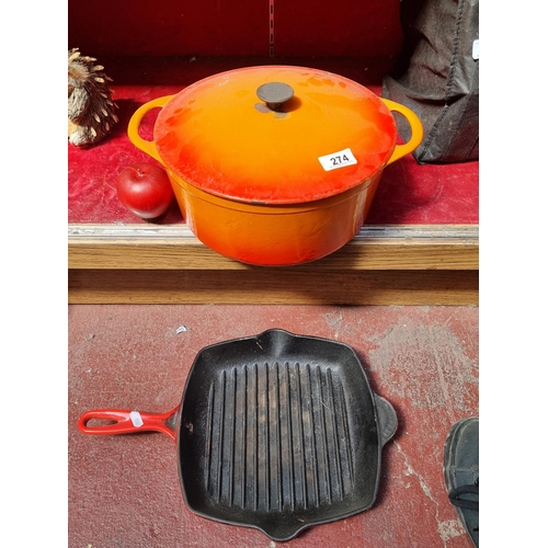 274 - A large enameled cast iron casserole dish made by Cousances, in vibrant graduated shades of orange a... 