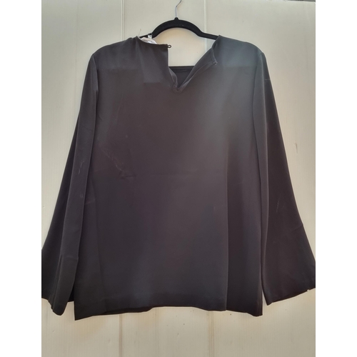 300 - A gorgeous new with tags  black women's blouse by Calvin Klein featuring studded detail to sleeve, w... 