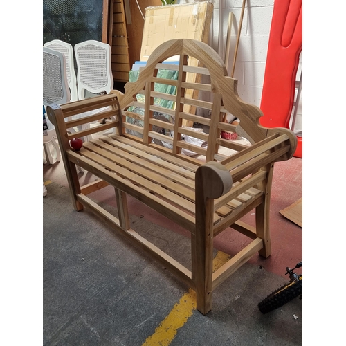 316 - Star Lot: A brand new well made Solid teak  two-seat Marlborough garden bench with an intricately ca... 