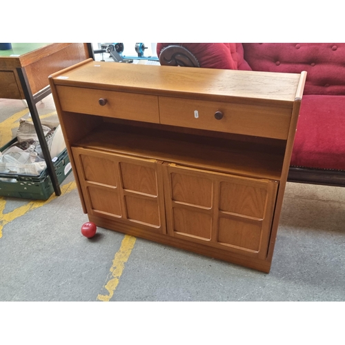 318 - A charming Mid Century cabinet with two deep drawers to top, shelving space and cupboard storage to ... 