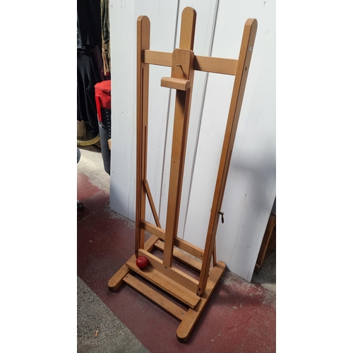 331 - A high quality Studio easel from Mabef with an adjustable working angle by lever handles and a heigh... 