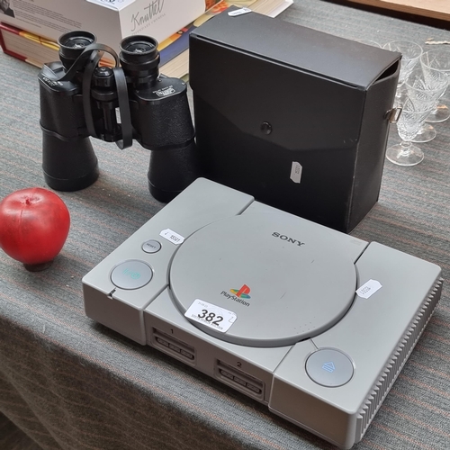 382 - Two items including an original Sony Playstation 1 (just the console ) and a pair of Mark Scheffel 2... 