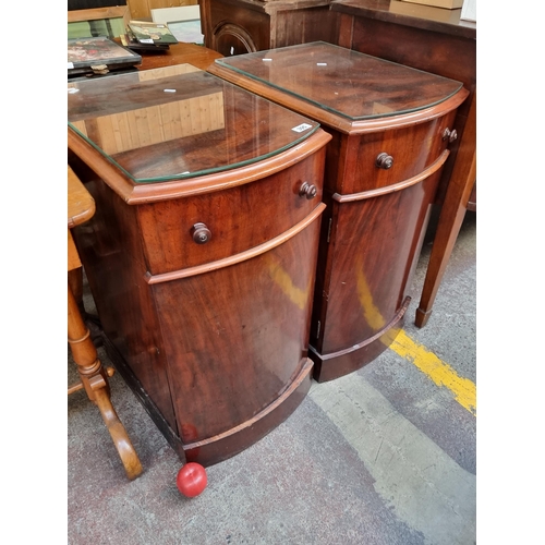 395 - Star lot : Two fabulous antique Jamaican mahogany bow fronted bedside locker with single cupboard to... 