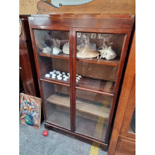 403 - Star Lot : A handsome vintage display cabinet of three interior shelves and glazed front. H142cm x W... 