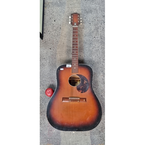 437 - A vintage acoustic guitar by Dutch brand Egmond. Fully stringed with tortoiseshell effect pick guard... 