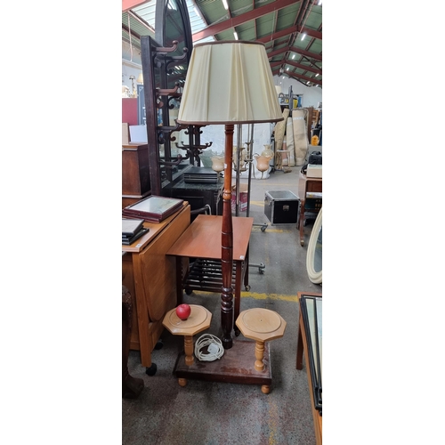 448 - A very interesting floor standing lamp with two plant stands fitted to the base. Lamp features a lov... 