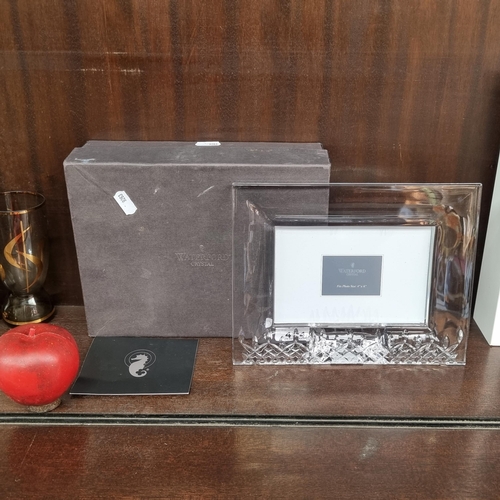 464 - A Waterford Crystal 4 x 6 photo frame in the Lismore pattern in original presentation box in gifting... 