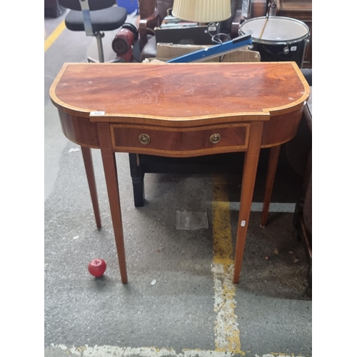 488 - Star Lot : An elegant antique console  table with a serpentine edge and lovely inlaid detail to top,... 