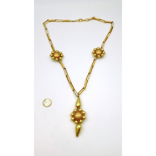 514 - A unusual gilded necklace by the designer Max Mara of Italy, featuring floral and link detail. Weigh... 