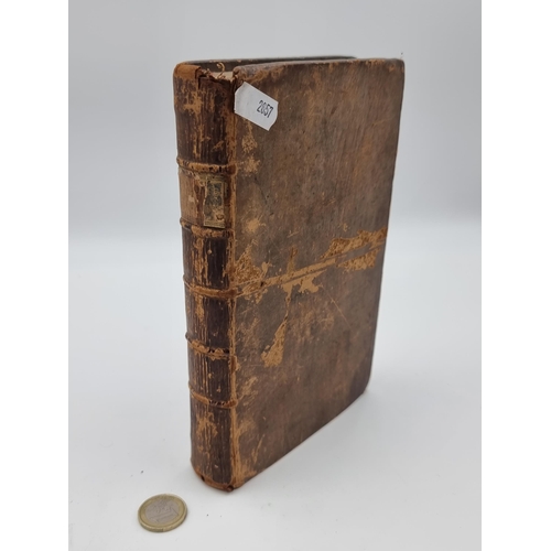 524 - An antique velum bound publication entitled 